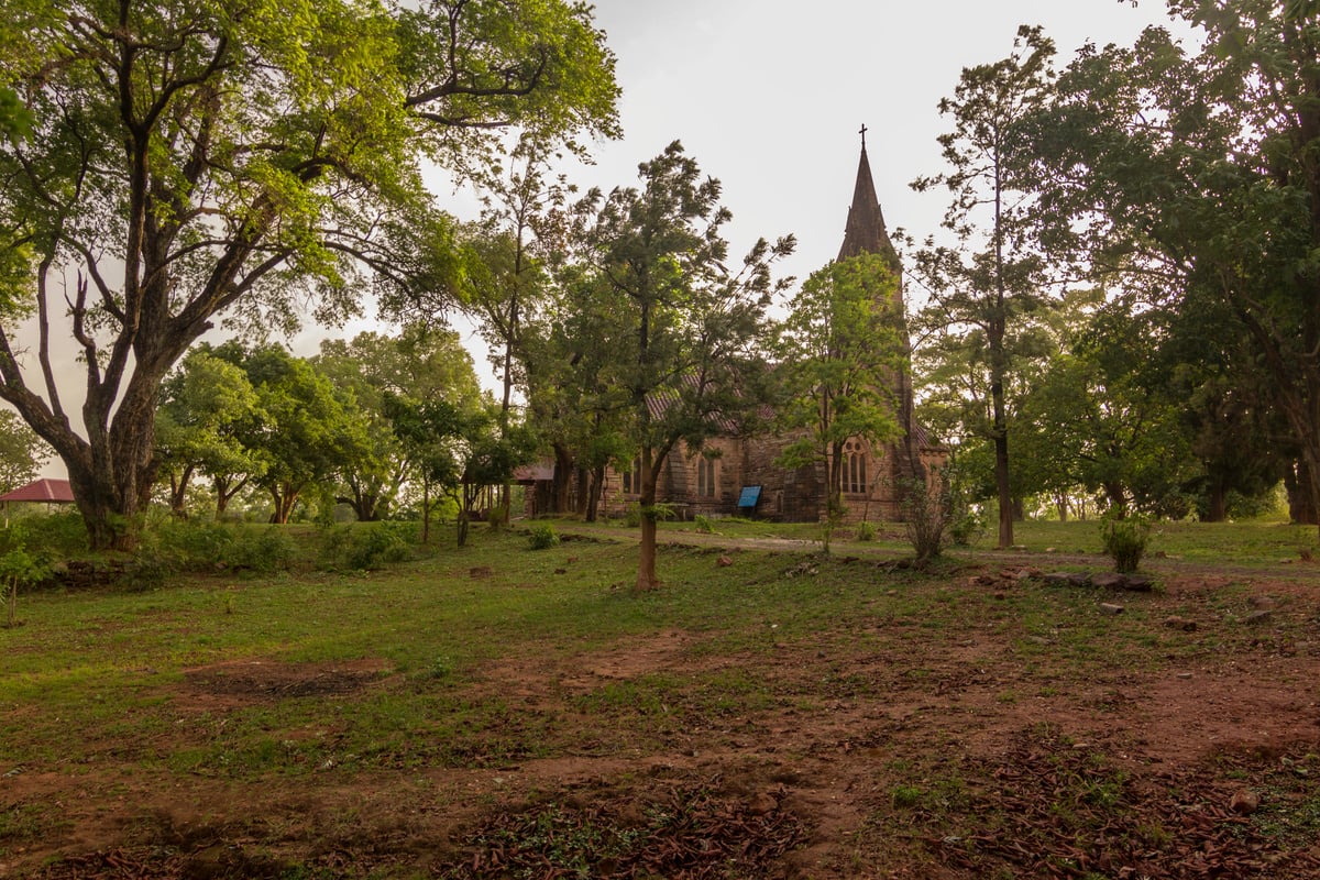 Old Anglican Church of British Era 1875 of Pachmarhi, with a Lush Green Lawns